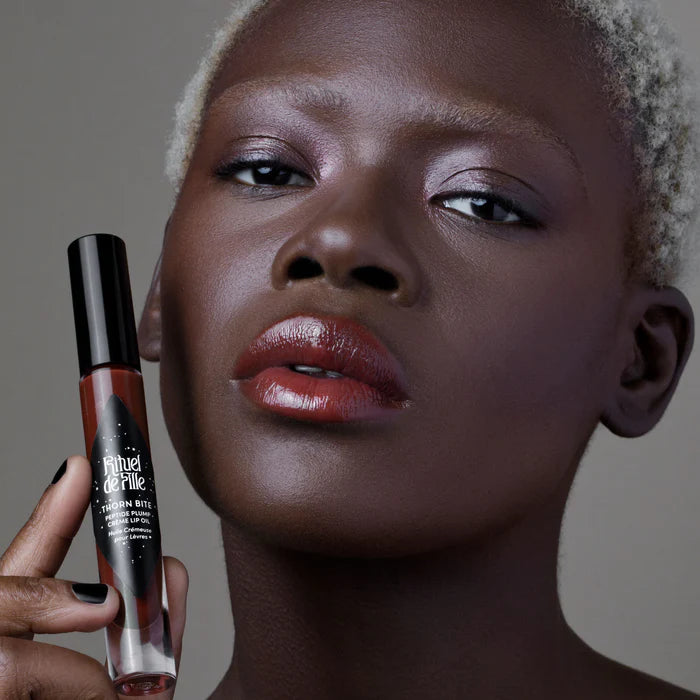 Load image into Gallery viewer, Rituel de Fille Thorn Bite Peptide Plump Crème Lip Oil: The Lipcare for Makeup Lovers
